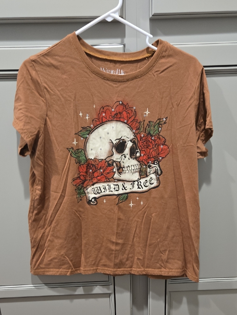 Wound Up Brown Tee with Skull & Red Floral Graphic